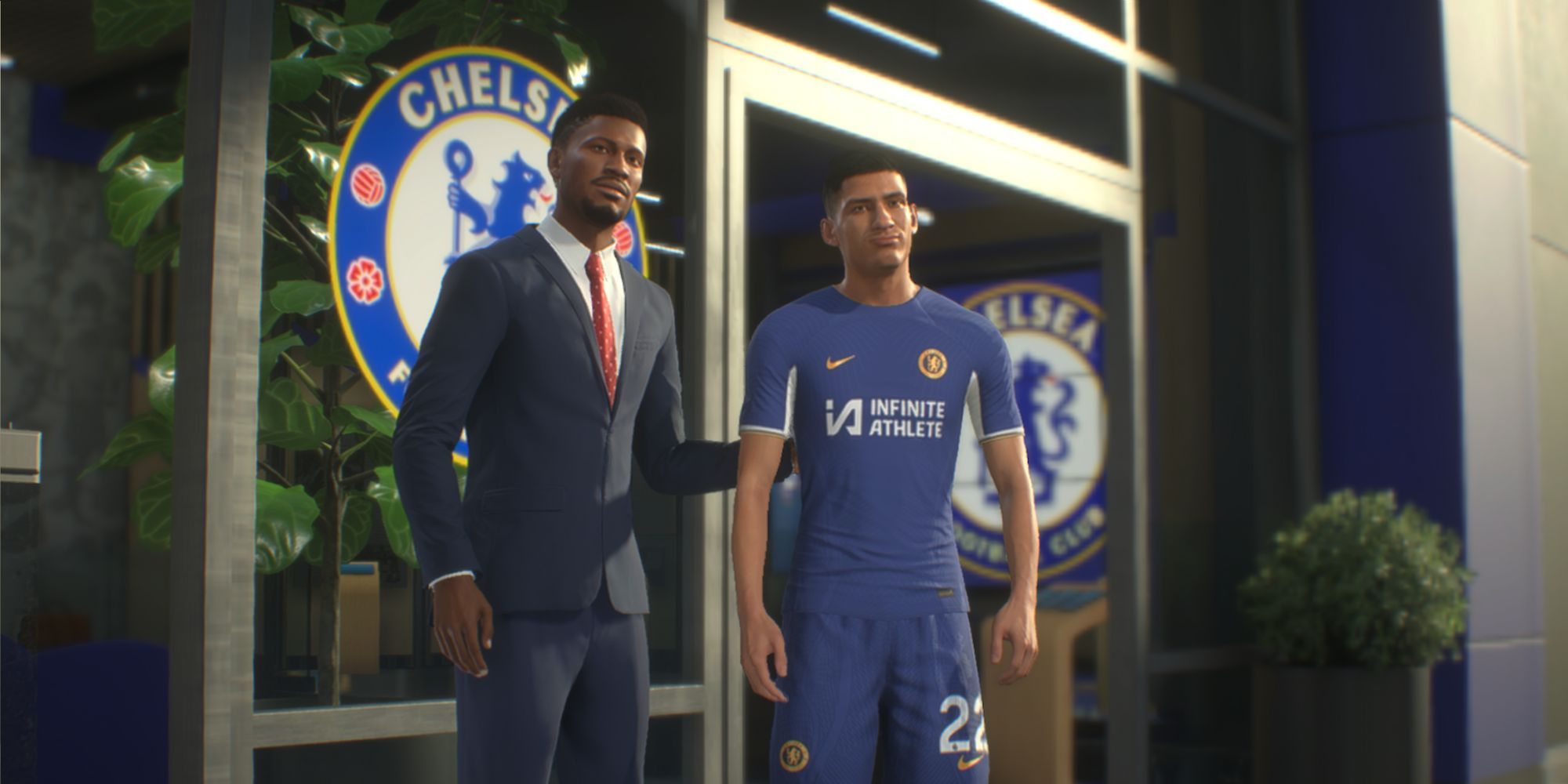 Un entrenador personalizado del Chelsea posa con un nuevo fichaje en una escena de EA Sports FC 24 Manager Career.