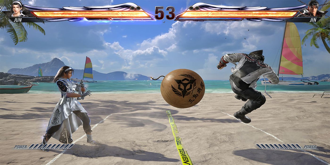 Jin se prepara para golpear un Tekken Ball hacia Jun durante un juego de Tekken Ball en la playa en Tekken 8.