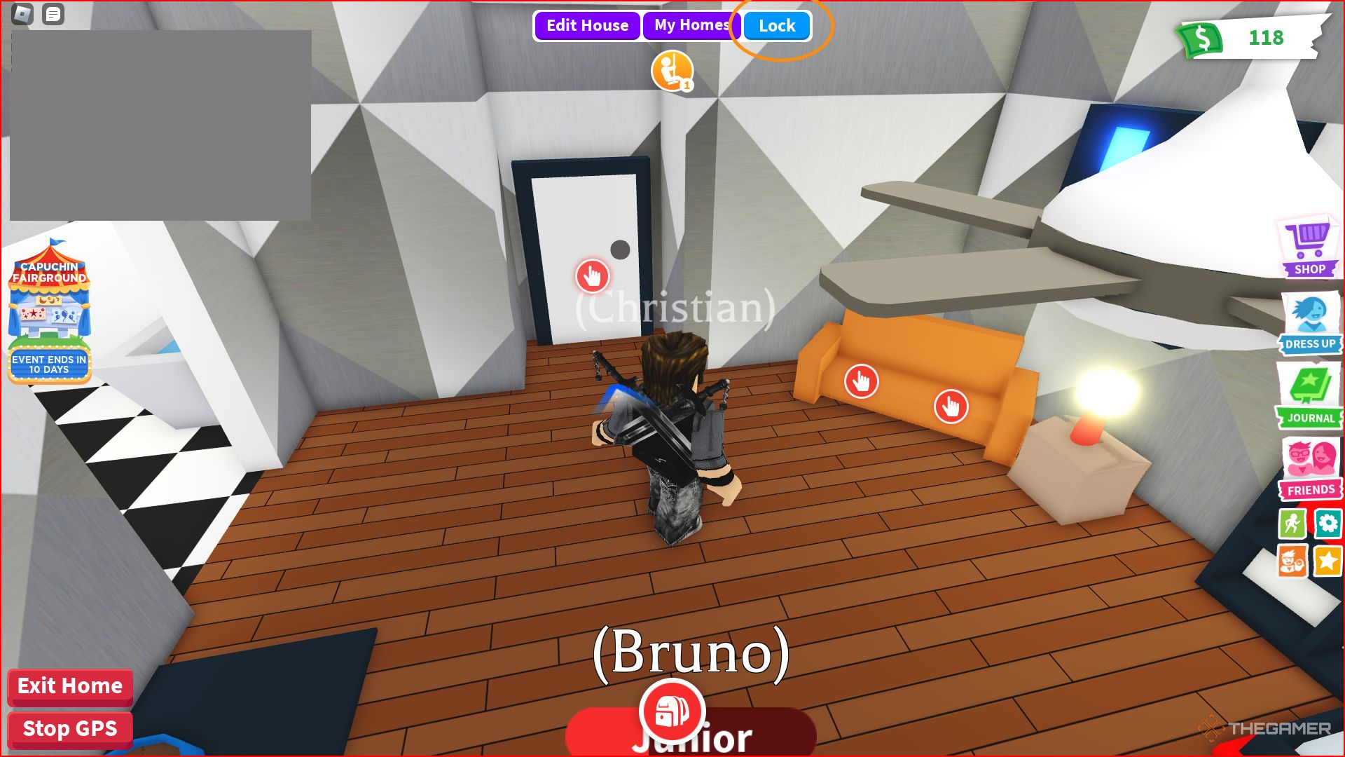 Una captura de pantalla de Roblox Adopt Me que muestra el botón de bloqueo resaltado en la parte superior de la pantalla dentro de una casa privada.