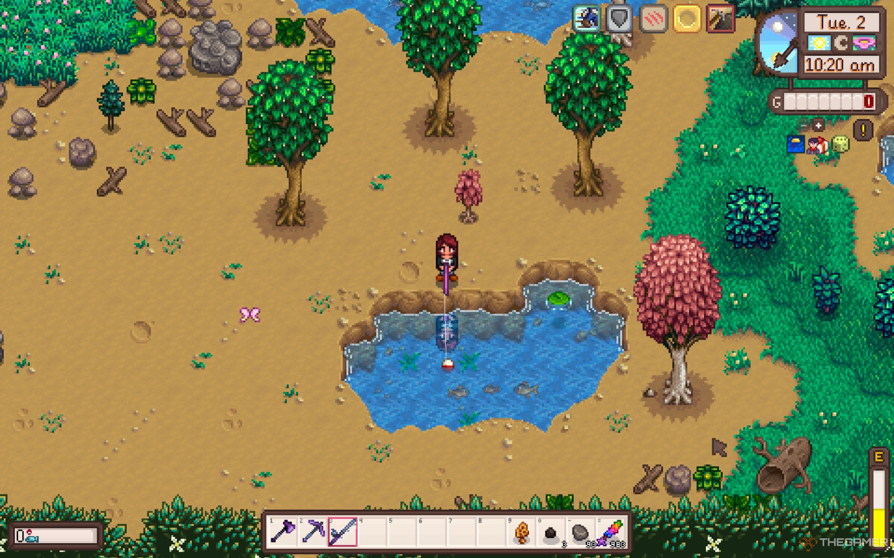 Granjero de Stardew Valley pescando en un estanque en el mapa de Forest Farm