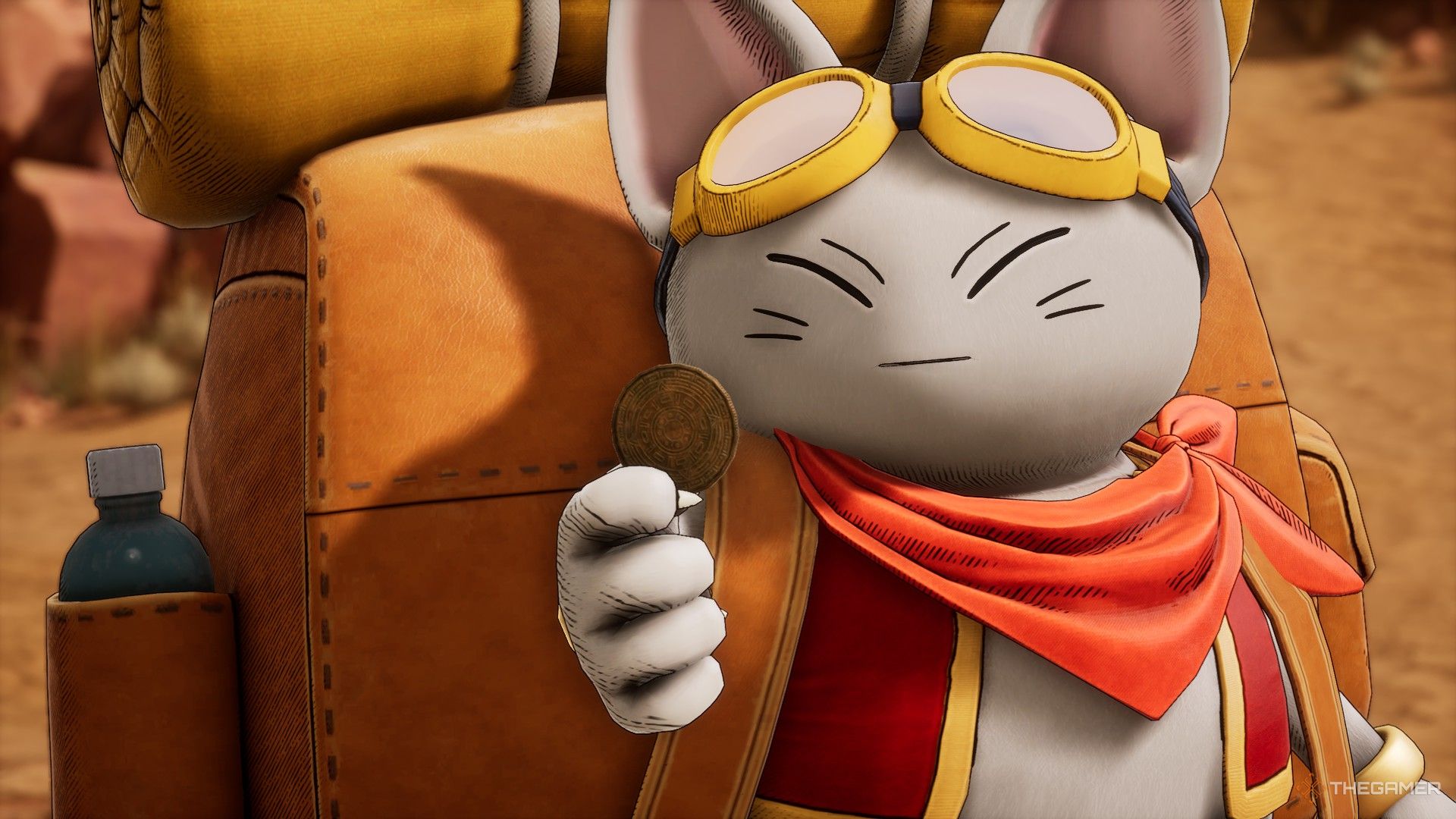 lassi sosteniendo una moneda antigua en tierra de arena