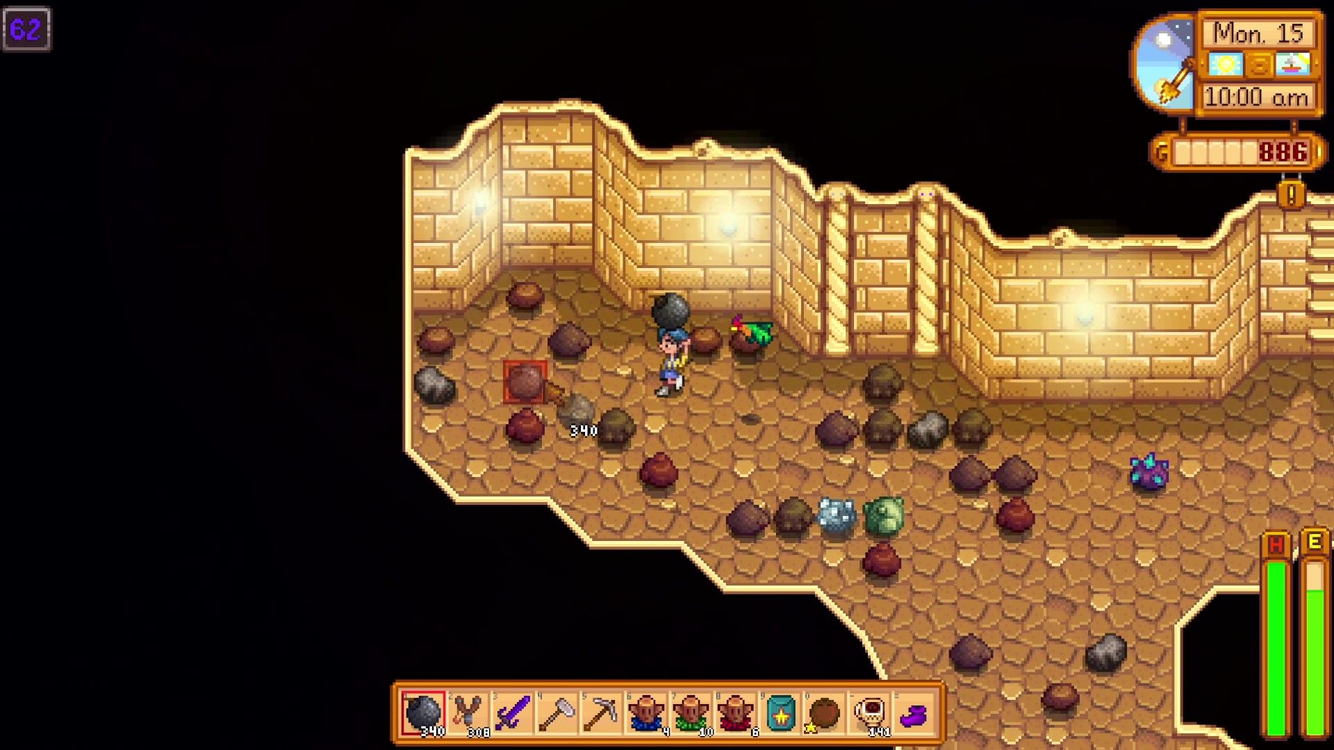 Un jugador y un compañero loro explorando Skull Cavern en Stardew Valley.