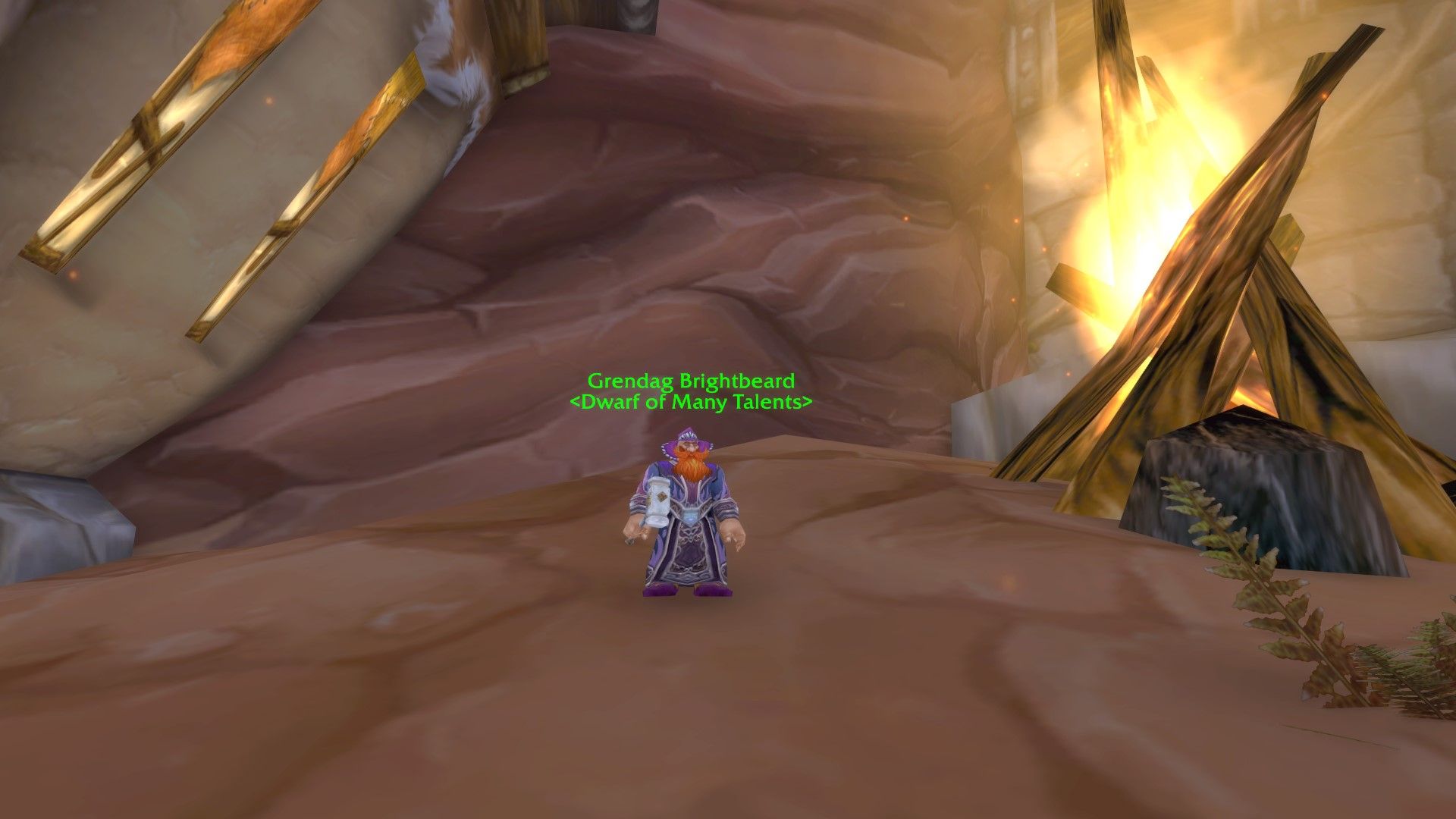 El enano, Grendag Brightbeard en Orgrimmar, junto a una hoguera.