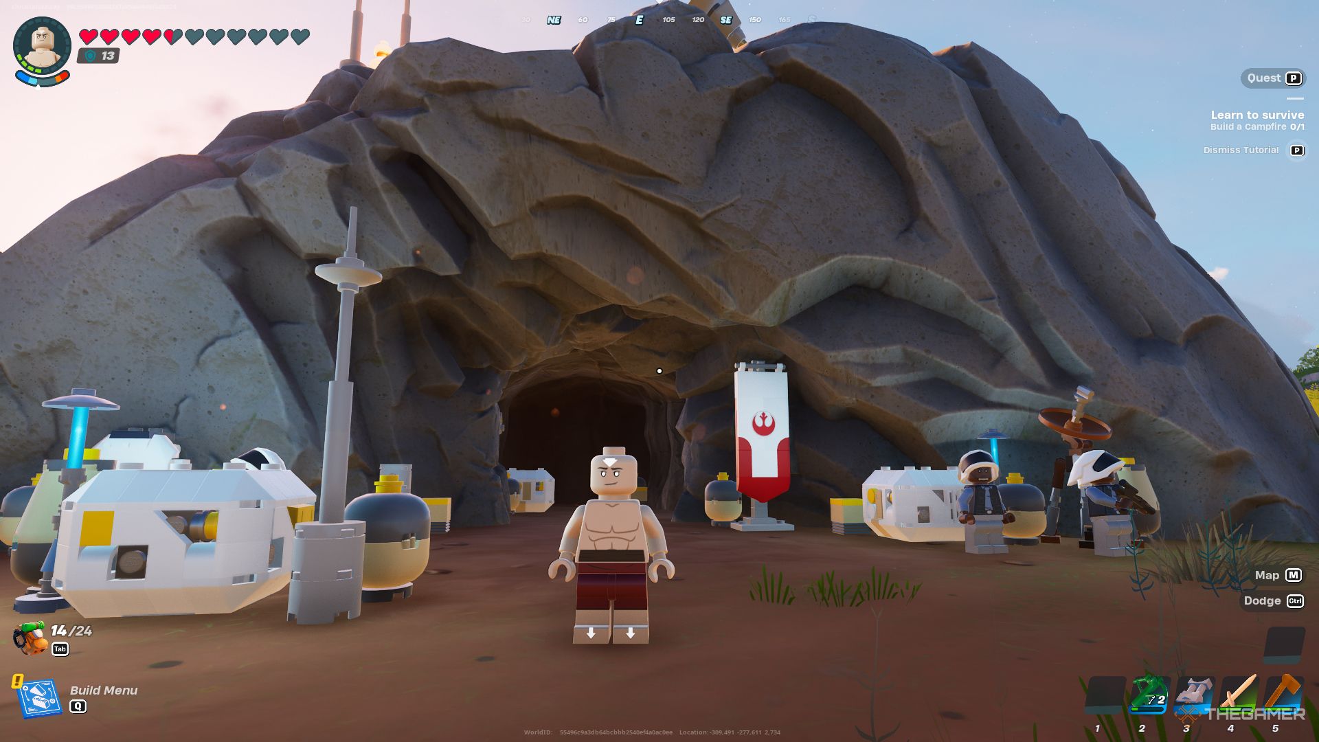 Una captura de pantalla de Lego Fortnite que muestra a un personaje jugador como Avatar Aang parado afuera de una cueva con pancartas de los Rebeldes y la Alianza Rebelde colgadas a su alrededor.