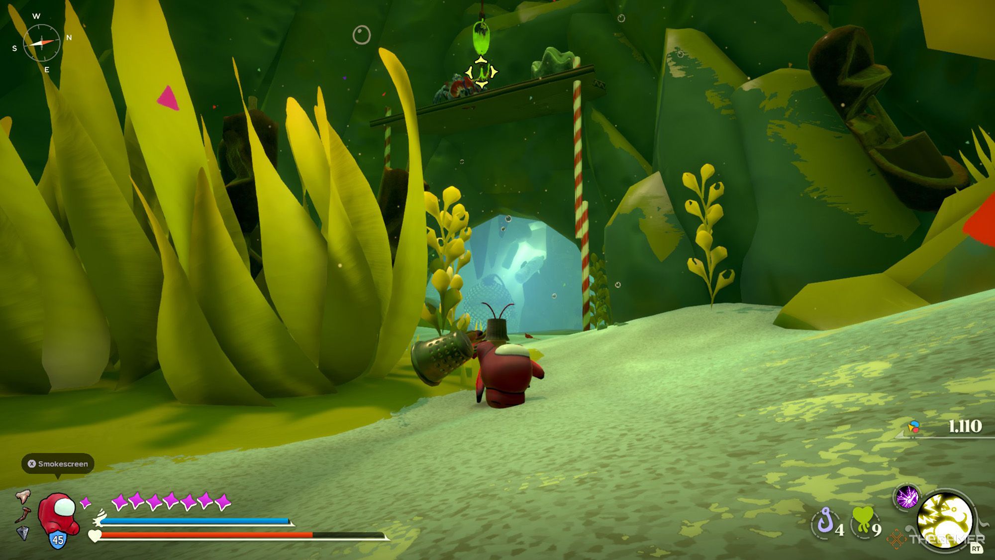 KKril apunta al anzuelo de arriba junto a un alga en Another Crab's Treasure.