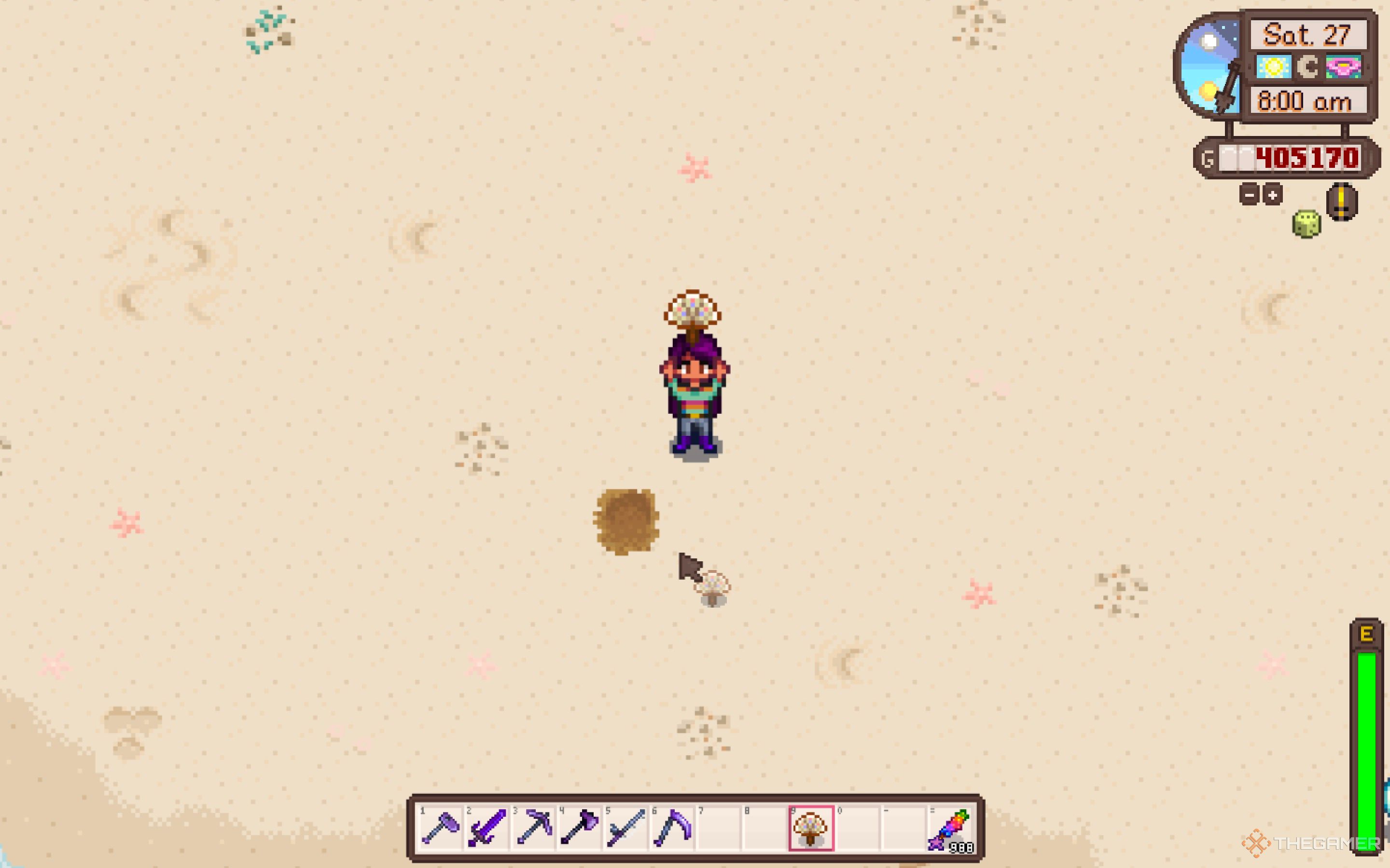 Granjero de Stardew Valley sosteniendo un abanico ornamental en la playa