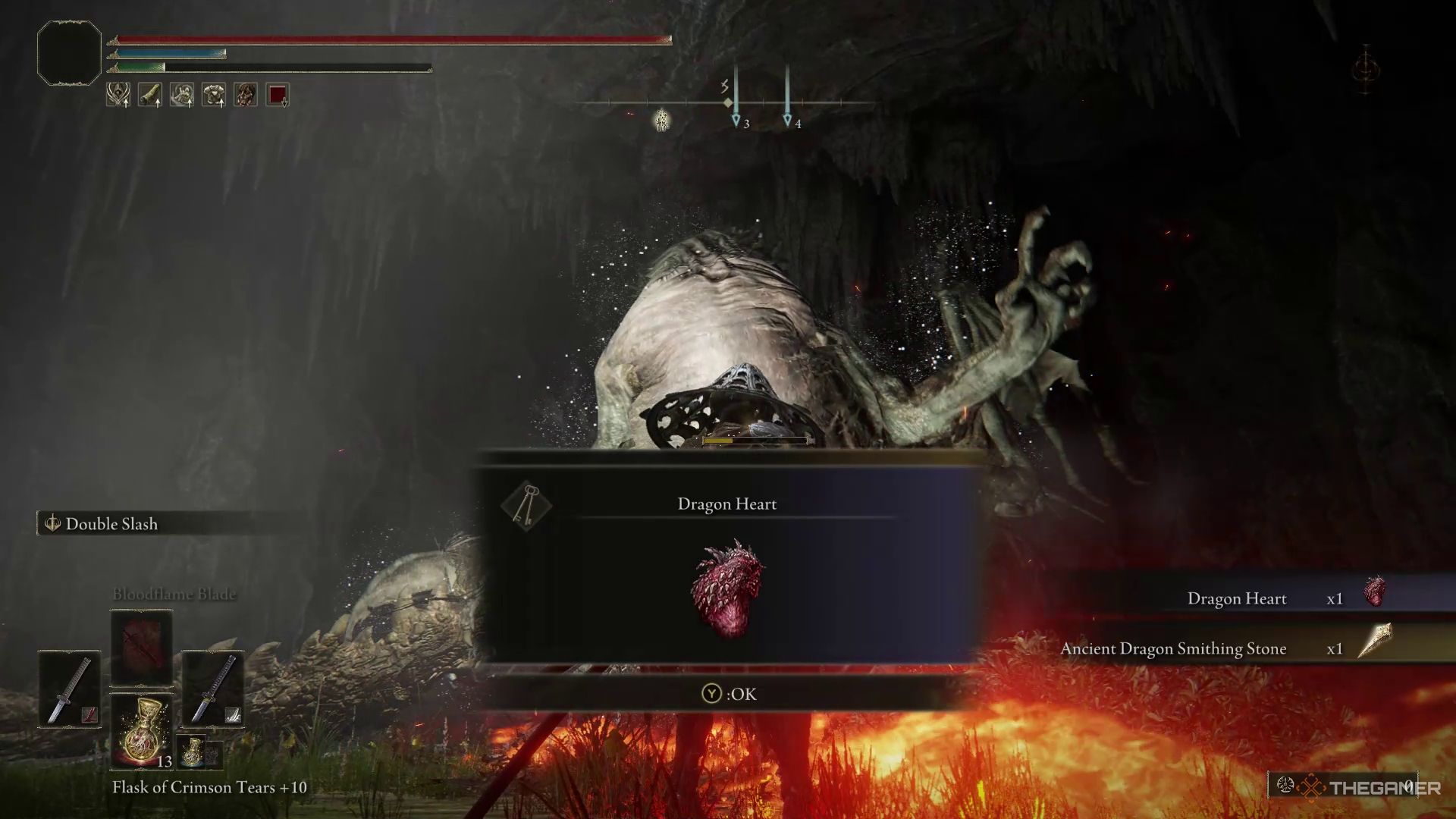 Un jugador empañado reclama sus recompensas por vencer a un Magma Wyrm en Elden Ring.