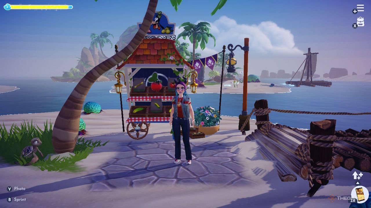 Avatar de Disney Dreamlight Valley junto al puesto de Goofy en Dazzle Beach.