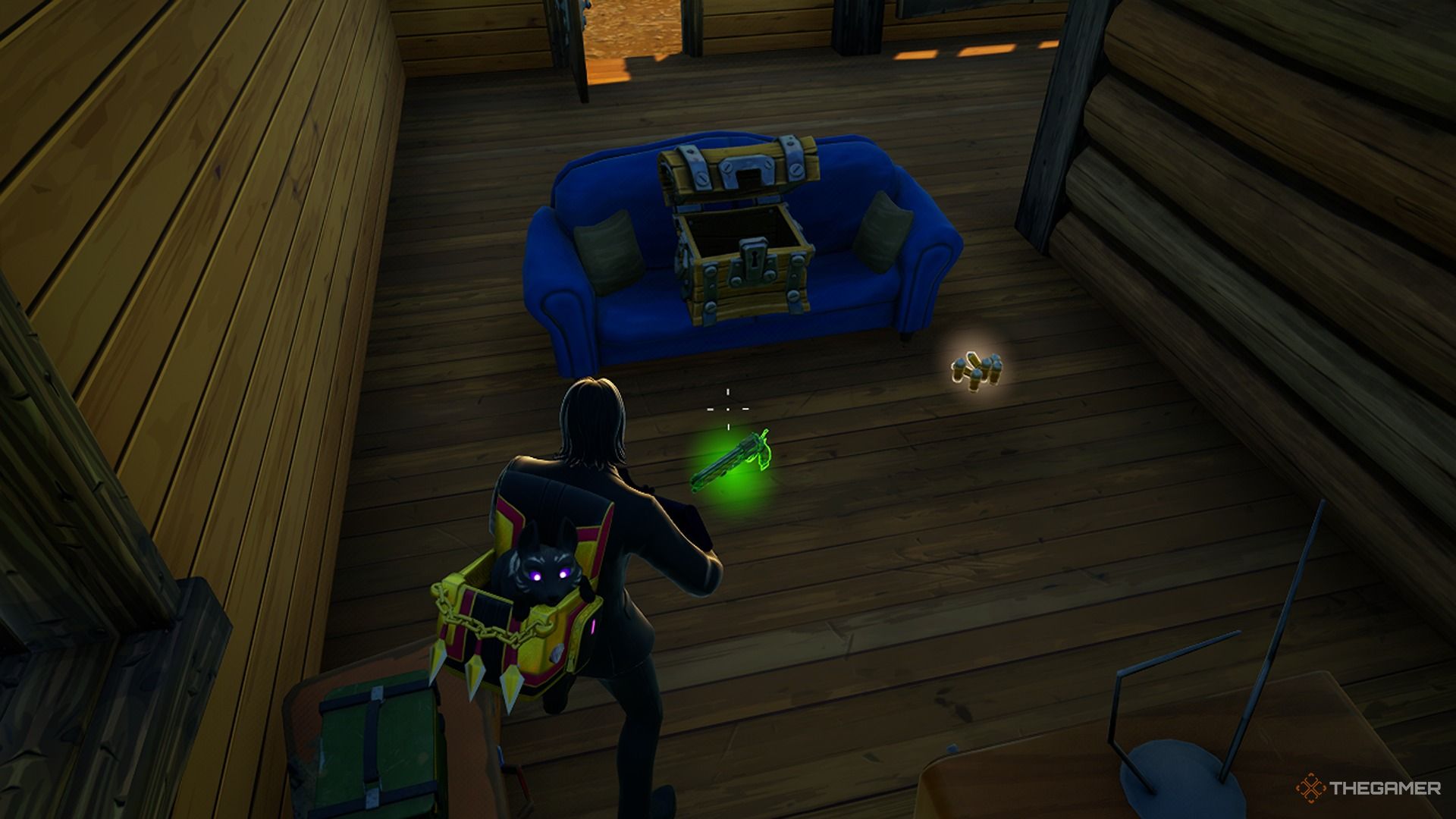John Wick de pie frente a la pistola Mammoth en Fortnite.