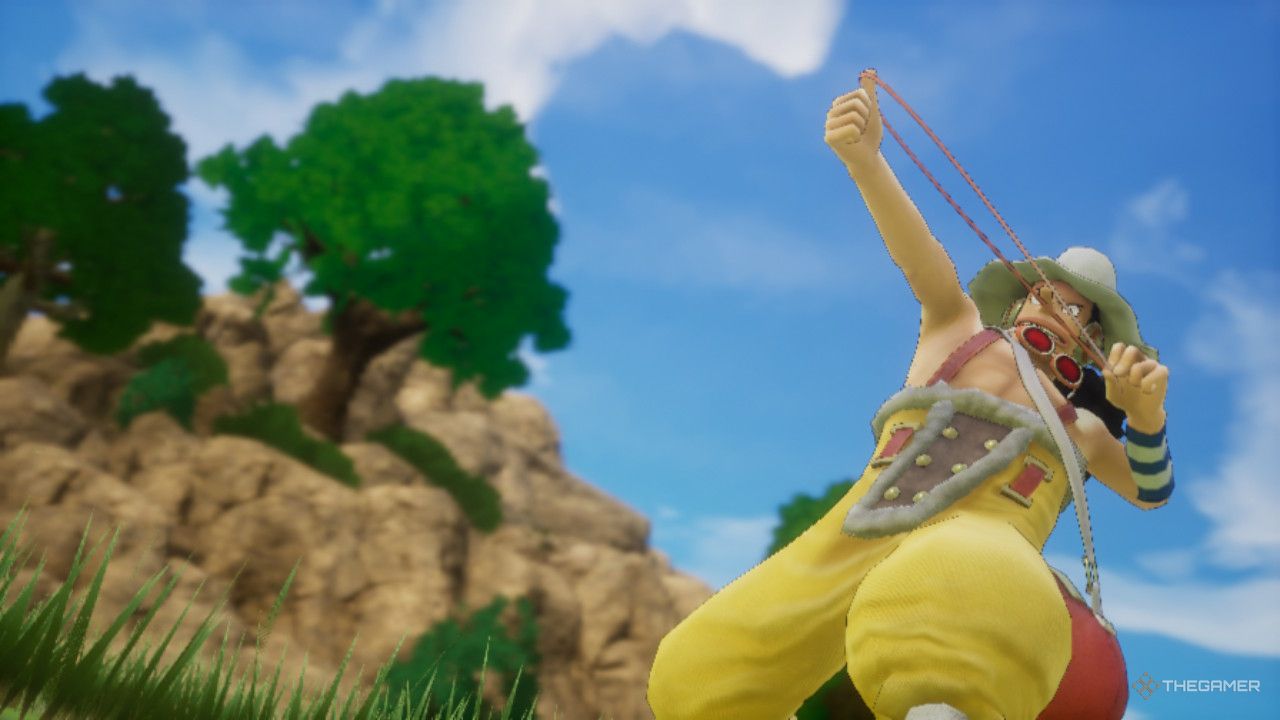 Usopp disparando su banda elástica en One Piece Odyssey.