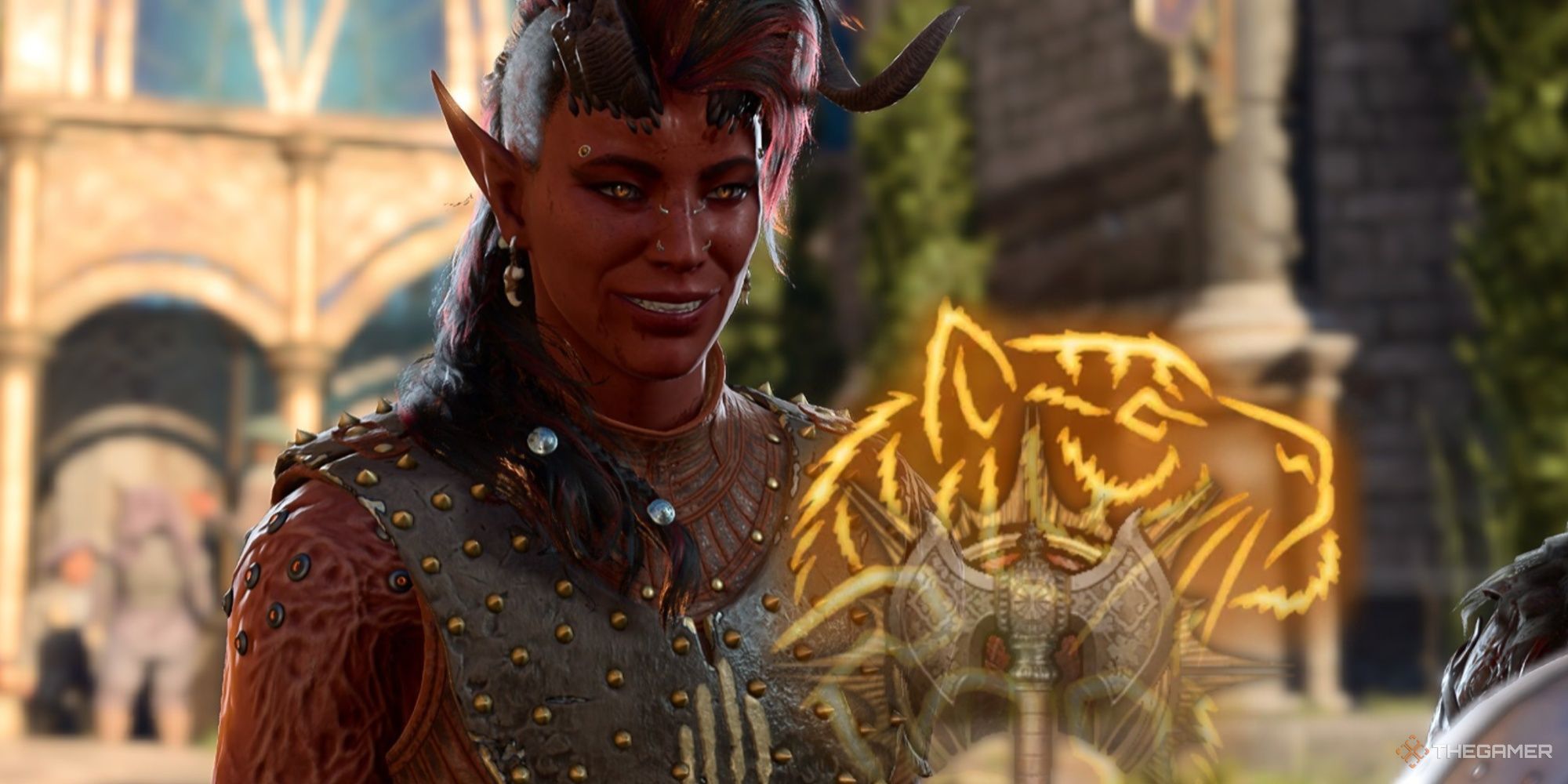 Karlach sonríe con los íconos Tiger Aspect y Barbarian superpuestos en Baldur's Gate 3.