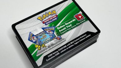 A Stack Of Code Cards of Pokémon TCG