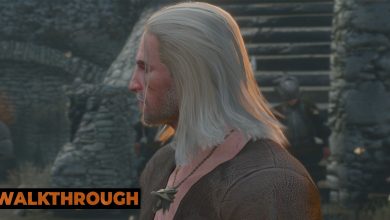 Geralt looks away as he stands in the middle of a prison.