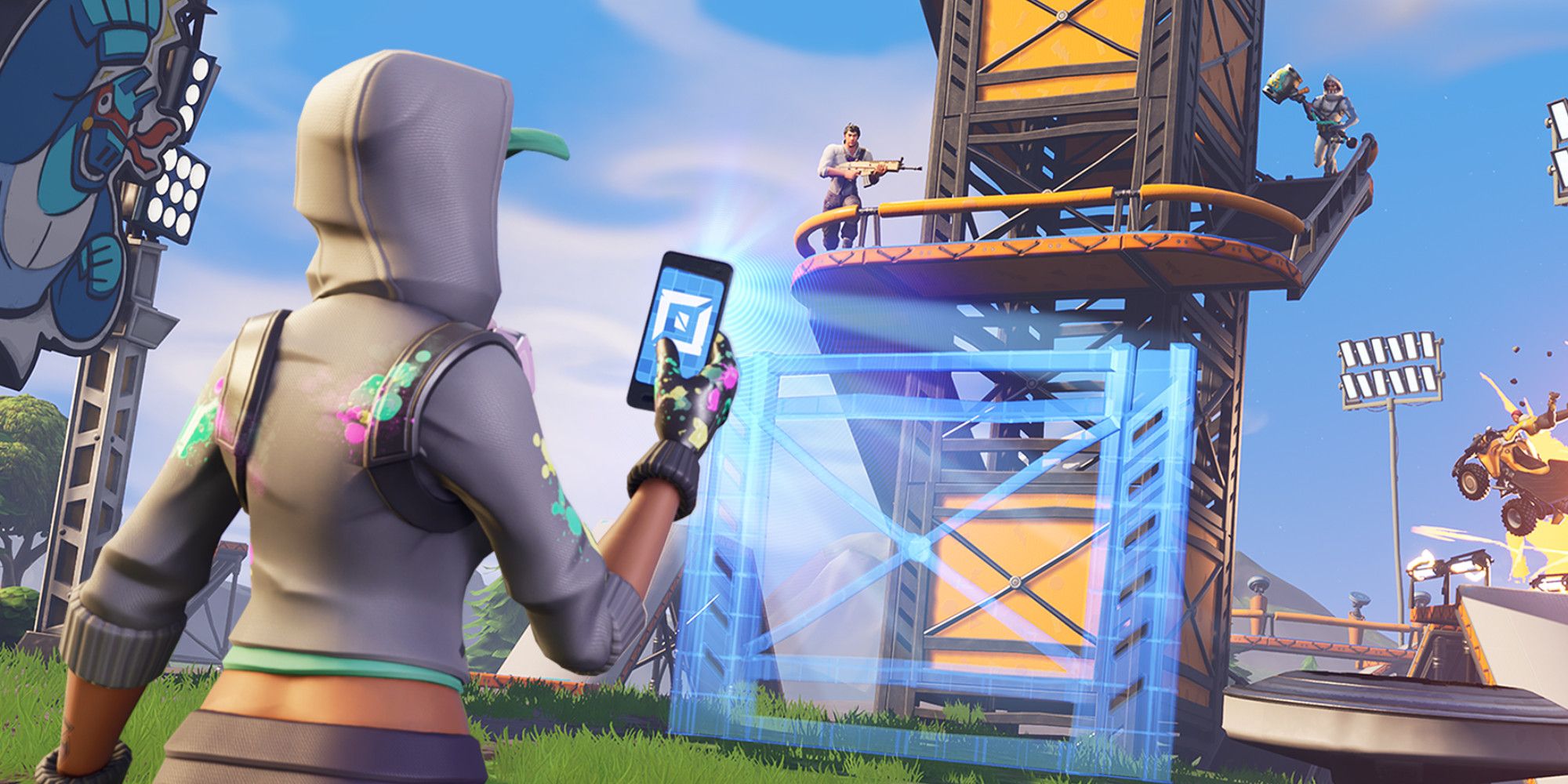 Personaje de Fortnite creando una torre con un teléfono móvil mientras otros dos personajes corren por un balcón de la torre