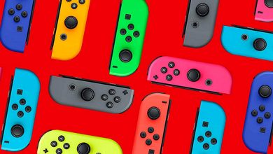 A selection of multicolor Joy-Cons for Nintendo Switch against a red background