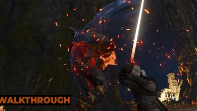 Geralt's sword glows red-hot as he attacks a fire elemental in a cave.