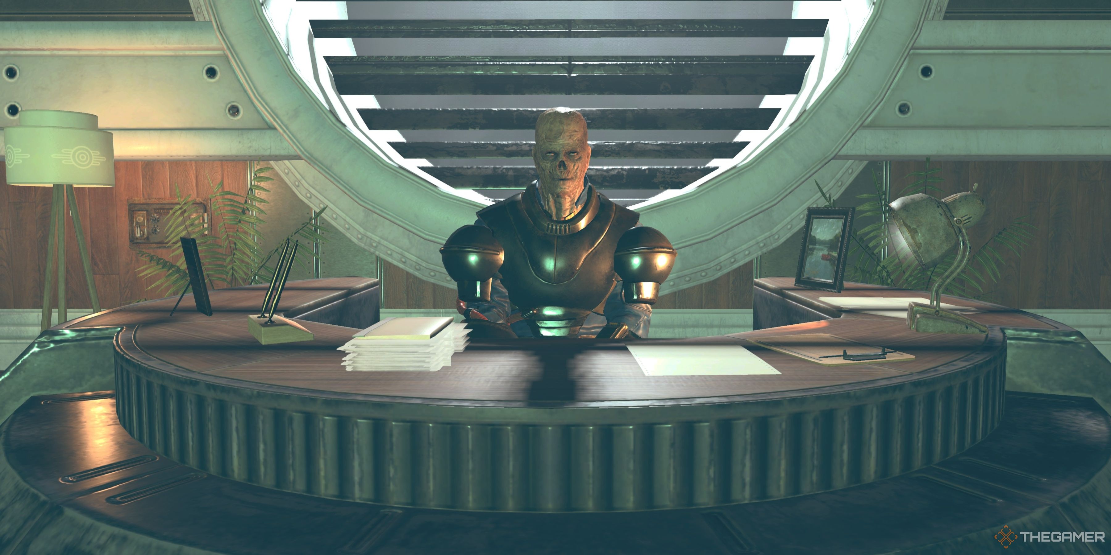 James Oberlin sentado en el escritorio del Refugio 63 en Fallout 76.