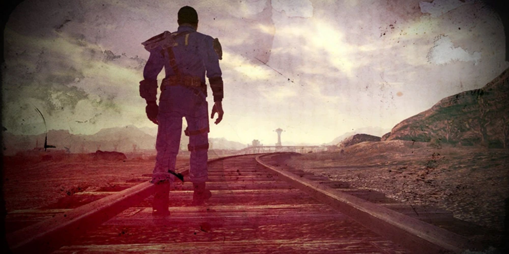 Una diapositiva final de Fallout New Vegas, que muestra al Mensajero caminando por las vías del tren.