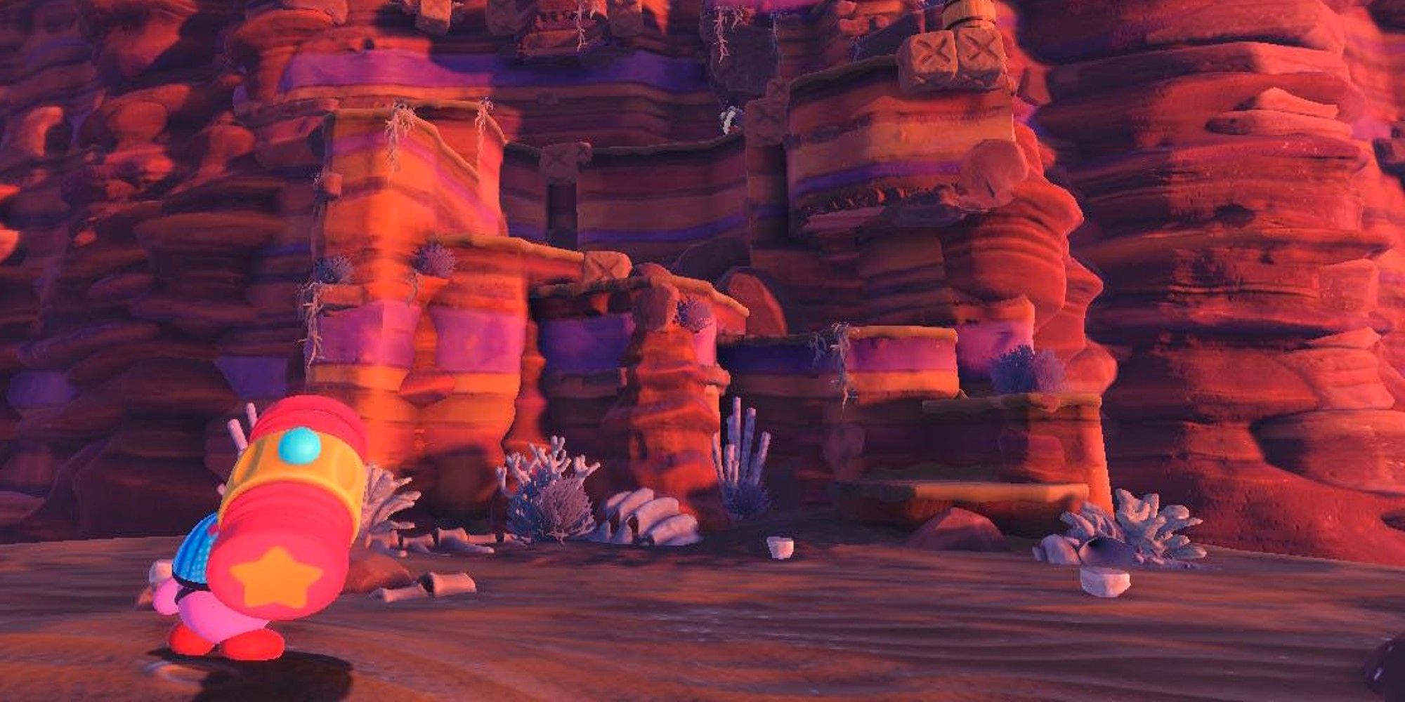 Kirby con martillo de juguete por acantilado en Moonlight Canyon