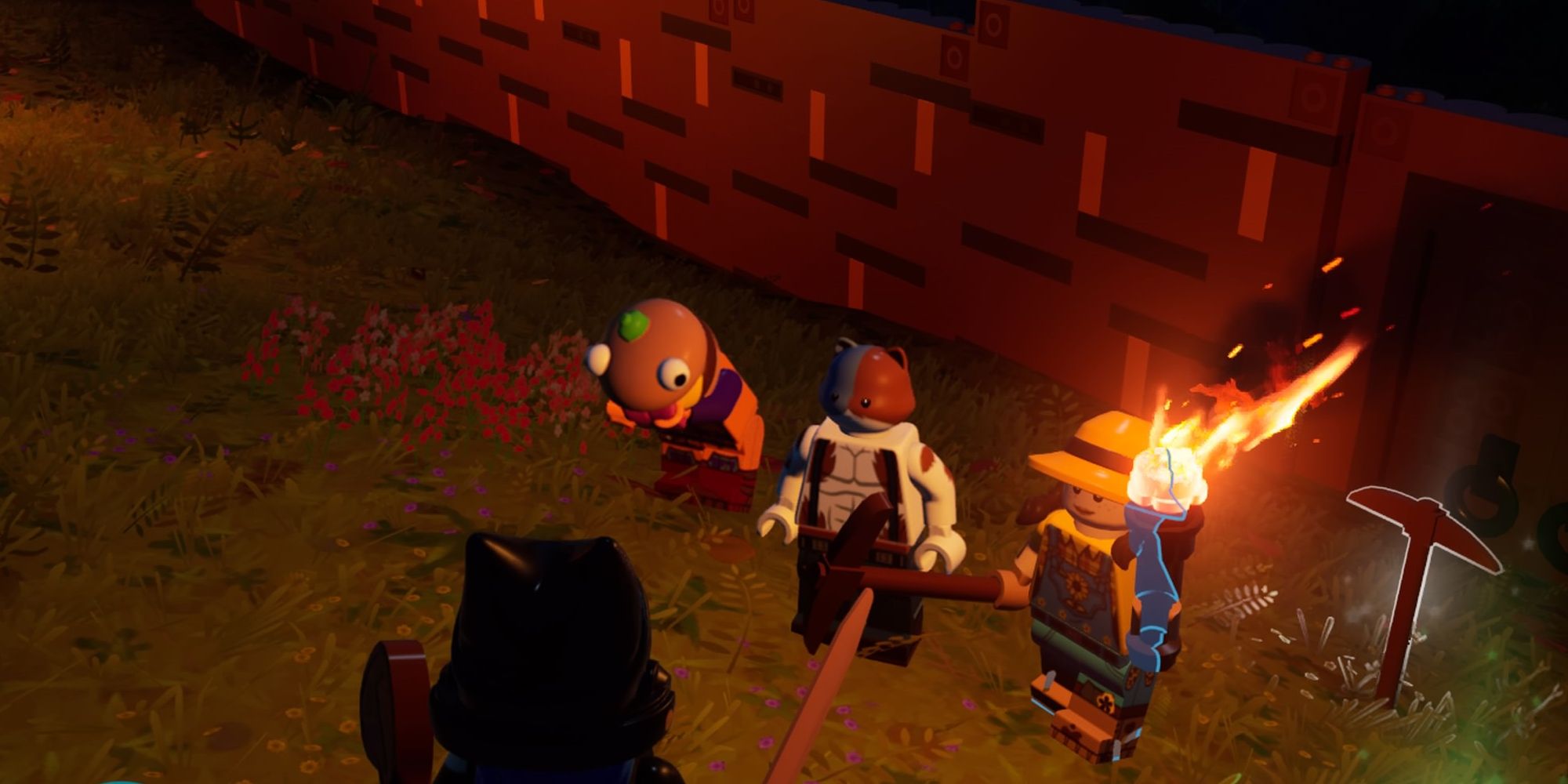 Un jugador mirando tres personajes de Fortnite en Lego Fortnite.