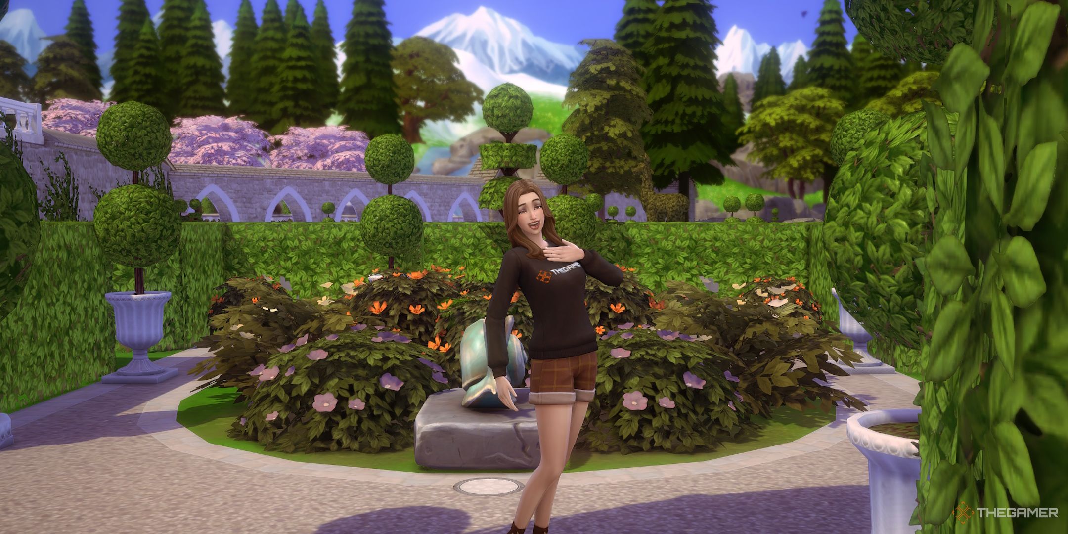 Una Sim posa junto a una montaña de flores para una captura de pantalla.