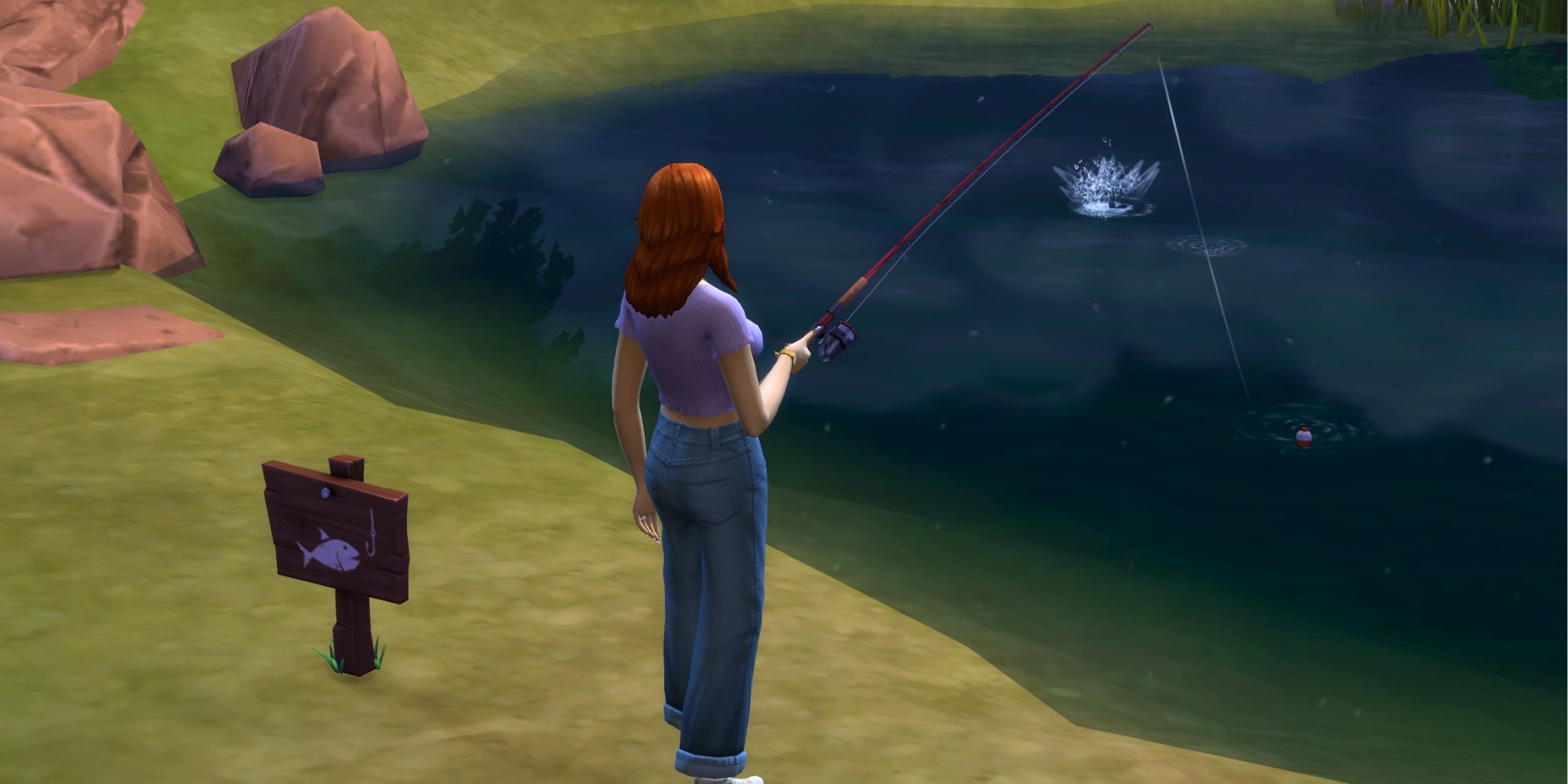Un Sim pelirrojo se encuentra al final de un estanque mientras pesca.